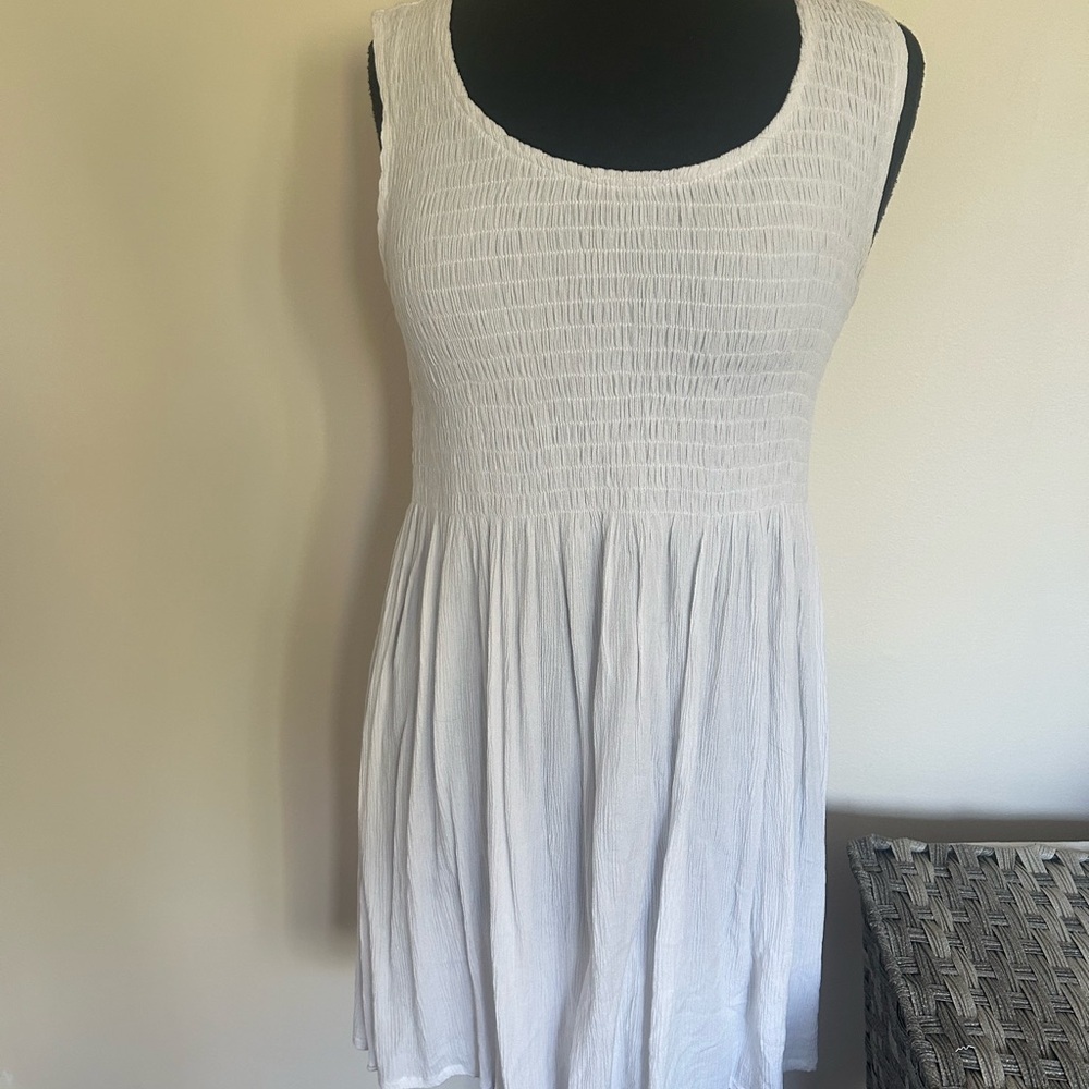 Vasna dress with smocked upper, light flowy pleats on lower half , Size S